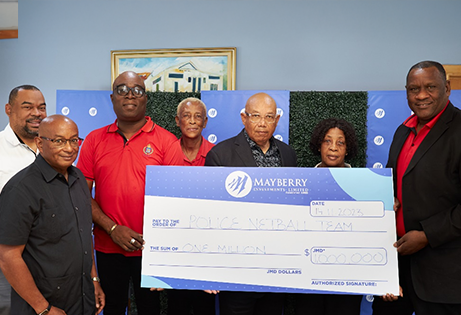 Why Mayberry - Image of the team holding a check